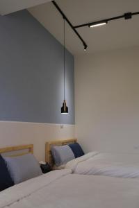 Voodi või voodid majutusasutuse Fish Tears B&B toas