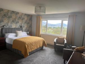 Postel nebo postele na pokoji v ubytování Braeburn Guesthouse