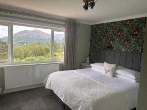 Nespecifikovaný výhled na hory nebo výhled na hory při pohledu z bed and breakfast