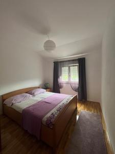 Postel nebo postele na pokoji v ubytování Apartmani Markić