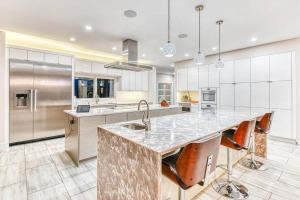 a kitchen with a large island with a sink at Heaven - Private Pool, Hot Tub, View, Steam Shower in Knoxville