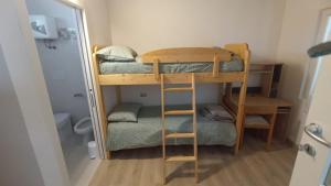 a small room with a bunk bed and a bathroom at Welcome to Ossola in Trontano +11 photos