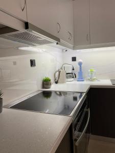A kitchen or kitchenette at SOFICOS Sea View Apartment