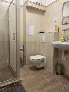Kúpeľňa v ubytovaní Harley Apartman