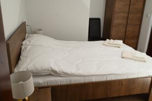 Postel nebo postele na pokoji v ubytování Стаи за гости Ингилизовата къща