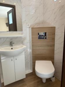 Koupelna v ubytování Pokoje Gościnne - Apartamenty MATI + 37 fotografií