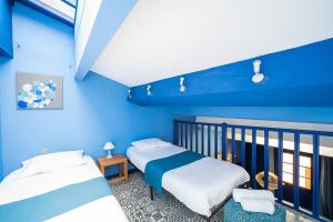 Кровать или кровати в номере Suites Coronell d'En Vila