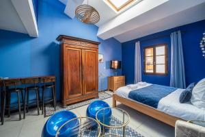 Кровать или кровати в номере Suites Coronell d'En Vila
