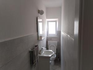 Kúpeľňa v ubytovaní Apartmani Živković + 37 fotografií