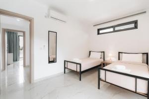 Posteľ alebo postele v izbe v ubytovaní Zante Luxury Apartment