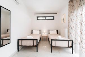 Posteľ alebo postele v izbe v ubytovaní Zante Luxury Apartment