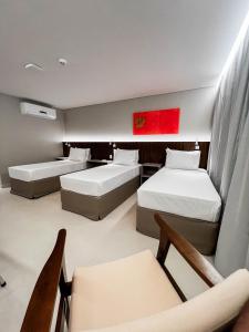 Postel nebo postele na pokoji v ubytování Smart Hotel João Pessoa