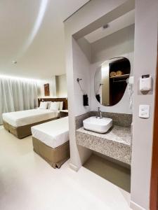 Postel nebo postele na pokoji v ubytování Smart Hotel João Pessoa