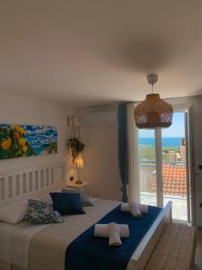 Postel nebo postele na pokoji v ubytování B&B Casa Prencipe