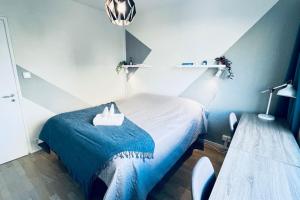 Ένα ή περισσότερα κρεβάτια σε δωμάτιο στο URBAN RETREAT by SujuKoto - 650m to market square +19 φωτογραφίες