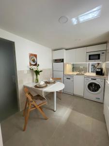Kuchyň nebo kuchyňský kout v ubytování Apartamento Tatoena, Puerto Viejo + 7 fotografií