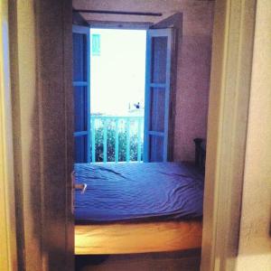 Katil atau katil-katil dalam bilik di Serifos Town Traditional Triplex