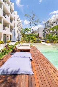 Bazén v ubytování Xibalba 423 Estudio ideal para ti/Gym/Piscina/Tina BY SANDY PAWERFUL nebo v jeho okolí