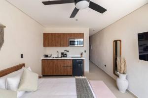 Kuchyň nebo kuchyňský kout v ubytování Xibalba 423 Estudio ideal para ti/Gym/Piscina/Tina BY SANDY PAWERFUL