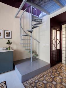 a spiral staircase in a house with a hallway at Birgu No 25 apartment 3 in Birgu