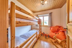 Postel nebo postele na pokoji v ubytování Chalet Apartments Ferius inklusive Jokercard im Sommer