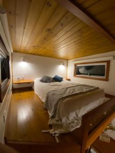 Ein Bett oder Betten in einem Zimmer der Unterkunft Peixe Crew Manguinhos