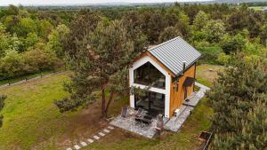 an overhead view of a tiny house in a field at Ossona Rest in Częstochowa