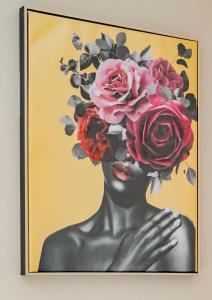 a painting of a woman with flowers on her head at Stylish home w/ parkng, fst wifi in Cambourne