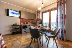 Kuchyňa alebo kuchynka v ubytovaní Apartamenty widokowe U Homera