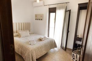 Ένα ή περισσότερα κρεβάτια σε δωμάτιο στο LA POSADA DE LA MUELA