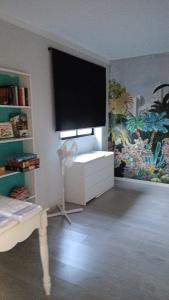 Μια τηλεόραση ή/και κέντρο ψυχαγωγίας στο Casa em Charneca de Caparica