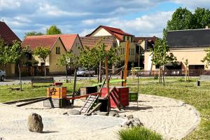 a park with a playground with a slide at Bambus, Jungle, Dachterrasse & bequem bis Zentrum in Radebeul