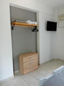 TV a/nebo společenská místnost v ubytování Nikolas Apartments