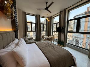 a bedroom with a bed with a view of the city at Studio with all you need next to Bellas Artes in Mexico City
