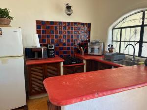 Virtuvė arba virtuvėlė apgyvendinimo įstaigoje Casita tranquila