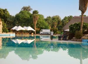 The swimming pool at or close to Nofa Riyadh, A Radisson Collection Resort