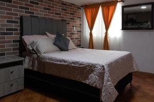 Llit o llits en una habitació de Hospedaje juandi