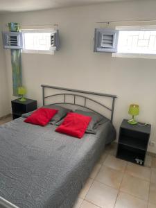 Postel nebo postele na pokoji v ubytování St Anne beau T2