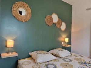 Postel nebo postele na pokoji v ubytování Le Catamaran + 21 fotografií