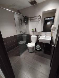 A bathroom at Swing & Pillows - Corona Inn Bukit Bintang