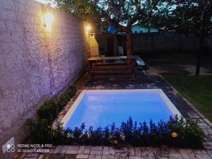 a swimming pool in the backyard of a house at Casa PHB in Parnaíba