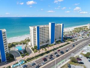an aerial view of a building next to the beach at Ocean Sands 1002 in St Pete Beach