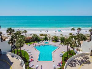 an aerial view of the beach and pool at the resort at Ocean Sands 1002 in St. Pete Beach
