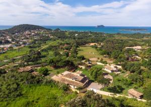 an aerial view of a village and the ocean at Casa Sol Búzios in Armacao dos Buzios