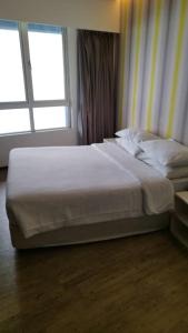 Katil atau katil-katil dalam bilik di 第一大酒店豪华客房1