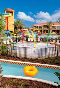 a pool at a resort with a water park at FantasyWorld Resort in Kissimmee