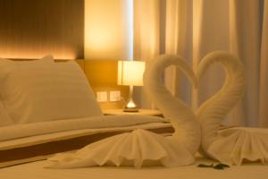 En eller flere senge i et værelse på Krabi Seaview Penthouse + 5 billeder