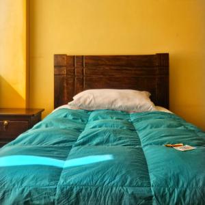 Postelja oz. postelje v sobi nastanitve Pachamama Hostel