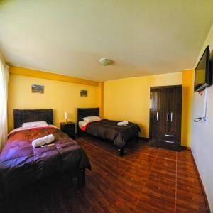Postelja oz. postelje v sobi nastanitve Pachamama Hostel