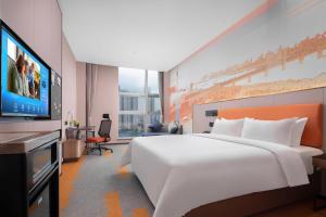 Televizors / izklaižu centrs naktsmītnē Hilton Hotel by Hampton Wuhan Zhongnan Street Branch